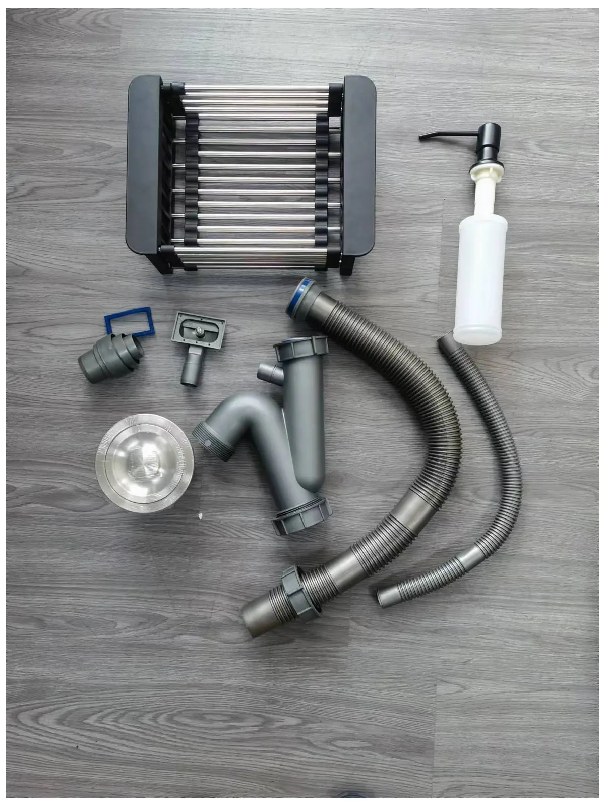 Kitchen sink drainage kit and accessories checked during sample approval